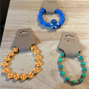 3 piece handmade bracelets. Stretch material .